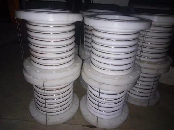 PTFE expansion joints with PTFE flanges